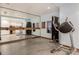 Bright fitness center with mirror and weight training equipment at 6803 E Main St # 1110, Scottsdale, AZ 85251