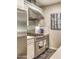 Modern kitchen with stainless steel appliances and white cabinets at 6803 E Main St # 1110, Scottsdale, AZ 85251