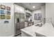 Modern kitchen with stainless steel appliances and white cabinets at 6803 E Main St # 1110, Scottsdale, AZ 85251