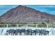 Poolside bar with marble top and modern barstools at 6803 E Main St # 1110, Scottsdale, AZ 85251