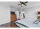 Bright bedroom with wood floors and access to bathroom at 7446 S 30Th Run, Phoenix, AZ 85042