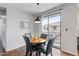 Cozy dining area with a round table and four black chairs at 7446 S 30Th Run, Phoenix, AZ 85042