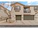 Two story townhome with attached two car garage and walkway at 7446 S 30Th Run, Phoenix, AZ 85042