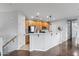 Modern kitchen with wood cabinets and stainless steel appliances at 7446 S 30Th Run, Phoenix, AZ 85042