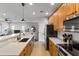Updated kitchen boasting stainless steel appliances and ample counter space at 7446 S 30Th Run, Phoenix, AZ 85042