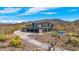 Aerial view of luxury home with pool and mountain backdrop at 7450 E Continental Mountain Dr # 5, Cave Creek, AZ 85331