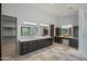 Bathroom with double vanity, walk-in shower, and access to a large closet at 7450 E Continental Mountain Dr # 5, Cave Creek, AZ 85331