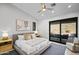Main bedroom with king bed, sliding doors to patio, mountain views at 7450 E Continental Mountain Dr # 5, Cave Creek, AZ 85331