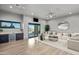 Common area with sectional sofa, large windows, and mountain views at 7450 E Continental Mountain Dr # 5, Cave Creek, AZ 85331