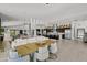 Modern dining area with large wooden table at 7450 E Continental Mountain Dr # 5, Cave Creek, AZ 85331