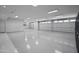 Large garage with polished concrete floor and multiple garage doors at 7450 E Continental Mountain Dr # 5, Cave Creek, AZ 85331