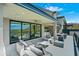 Outdoor patio with seating area and built-in grill, overlooking scenic vistas at 7450 E Continental Mountain Dr # 5, Cave Creek, AZ 85331
