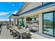 Outdoor dining area on a patio with built-in grill and mountain views at 7450 E Continental Mountain Dr # 5, Cave Creek, AZ 85331