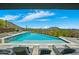 Infinity pool with mountain views and lounge chairs at 7450 E Continental Mountain Dr # 5, Cave Creek, AZ 85331