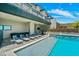 Inviting pool area with lounge chairs and mountain views at 7450 E Continental Mountain Dr # 5, Cave Creek, AZ 85331