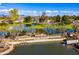 Aerial view of McCormick Ranch community with ponds and landscaping at 7500 E Mccormick Pkwy # 32, Scottsdale, AZ 85258