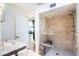 Spa-like bathroom featuring a glass shower enclosure and a bench at 7500 E Mccormick Pkwy # 32, Scottsdale, AZ 85258