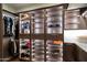 Well-organized closet with ample shelving and hanging space at 7500 E Mccormick Pkwy # 32, Scottsdale, AZ 85258