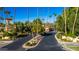 Entrance to Colonia Encantada community with palm trees and signage at 7500 E Mccormick Pkwy # 32, Scottsdale, AZ 85258