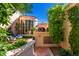 Inviting courtyard with seating area, lush landscaping, and architectural details at 7500 E Mccormick Pkwy # 32, Scottsdale, AZ 85258