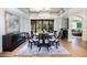 Elegant dining room with a chandelier and access to a patio at 7500 E Mccormick Pkwy # 32, Scottsdale, AZ 85258