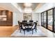 Bright dining room with large windows and a modern chandelier at 7500 E Mccormick Pkwy # 32, Scottsdale, AZ 85258