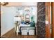 Elegant entryway with ornate door, hardwood floors, and view of living room at 7500 E Mccormick Pkwy # 32, Scottsdale, AZ 85258