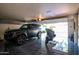 Spacious two-car garage with epoxy flooring and ample storage at 7500 E Mccormick Pkwy # 32, Scottsdale, AZ 85258