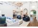 Open living room with high ceilings, hardwood floors, and ample natural light at 7500 E Mccormick Pkwy # 32, Scottsdale, AZ 85258