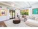 Spacious living area with a comfortable sectional sofa and large windows at 7500 E Mccormick Pkwy # 32, Scottsdale, AZ 85258