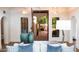 Living room view through entryway, showing interior design at 7500 E Mccormick Pkwy # 32, Scottsdale, AZ 85258