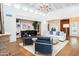 Bright living room with hardwood floors, comfortable seating, and art at 7500 E Mccormick Pkwy # 32, Scottsdale, AZ 85258