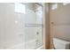 Clean bathroom with shower/tub and window at 8037 E Thorntree Dr, Scottsdale, AZ 85266