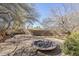 Outdoor fire pit area with desert landscaping at 8037 E Thorntree Dr, Scottsdale, AZ 85266