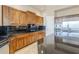 Spacious kitchen with stainless steel appliances and granite countertops at 8037 E Thorntree Dr, Scottsdale, AZ 85266