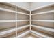 Spacious pantry with ample shelving for storage at 8037 E Thorntree Dr, Scottsdale, AZ 85266