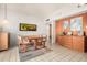 Mid-century dining room with wood furniture and built-in cabinetry at 8208 E Shea Blvd, Scottsdale, AZ 85260
