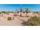 Mid-century modern home with desert landscaping and mountain views at 8208 E Shea Blvd, Scottsdale, AZ 85260