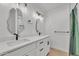 Modern bathroom with double vanity and walk-in shower at 827 W Weldon Ave, Phoenix, AZ 85013