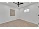 Empty bedroom with neutral decor and ceiling fan at 827 W Weldon Ave, Phoenix, AZ 85013