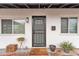 Modern front door with security gate and sidelights at 827 W Weldon Ave, Phoenix, AZ 85013