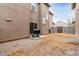 Small backyard with gravel and smoker at 9331 S 33Rd Gln, Laveen, AZ 85339