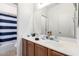 Clean bathroom with double vanity and shower/tub combo at 9331 S 33Rd Gln, Laveen, AZ 85339