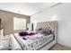 Main bedroom with a large bed and ample natural light at 9331 S 33Rd Gln, Laveen, AZ 85339