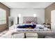 Main bedroom with a large bed and ample natural light at 9331 S 33Rd Gln, Laveen, AZ 85339