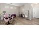 Neat entryway with a full-length mirror and wood flooring at 9331 S 33Rd Gln, Laveen, AZ 85339