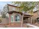Two-story house with a front porch and walkway at 9331 S 33Rd Gln, Laveen, AZ 85339