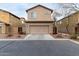 Two-story home with attached garage at 9331 S 33Rd Gln, Laveen, AZ 85339