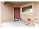 Front porch with rocking chair and welcome mat at 9331 S 33Rd Gln, Laveen, AZ 85339