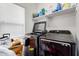 Laundry room with washer, dryer, and shelving at 9331 S 33Rd Gln, Laveen, AZ 85339